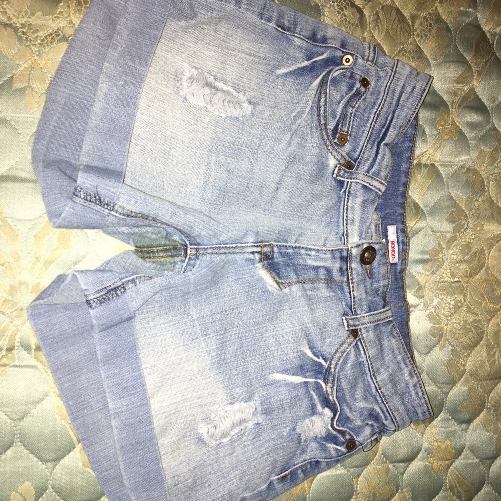 Light denim distressed shorts